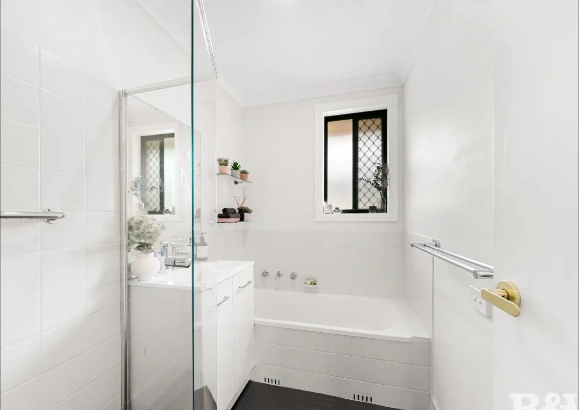 Woy Woy House bathroom in warm neutral tones